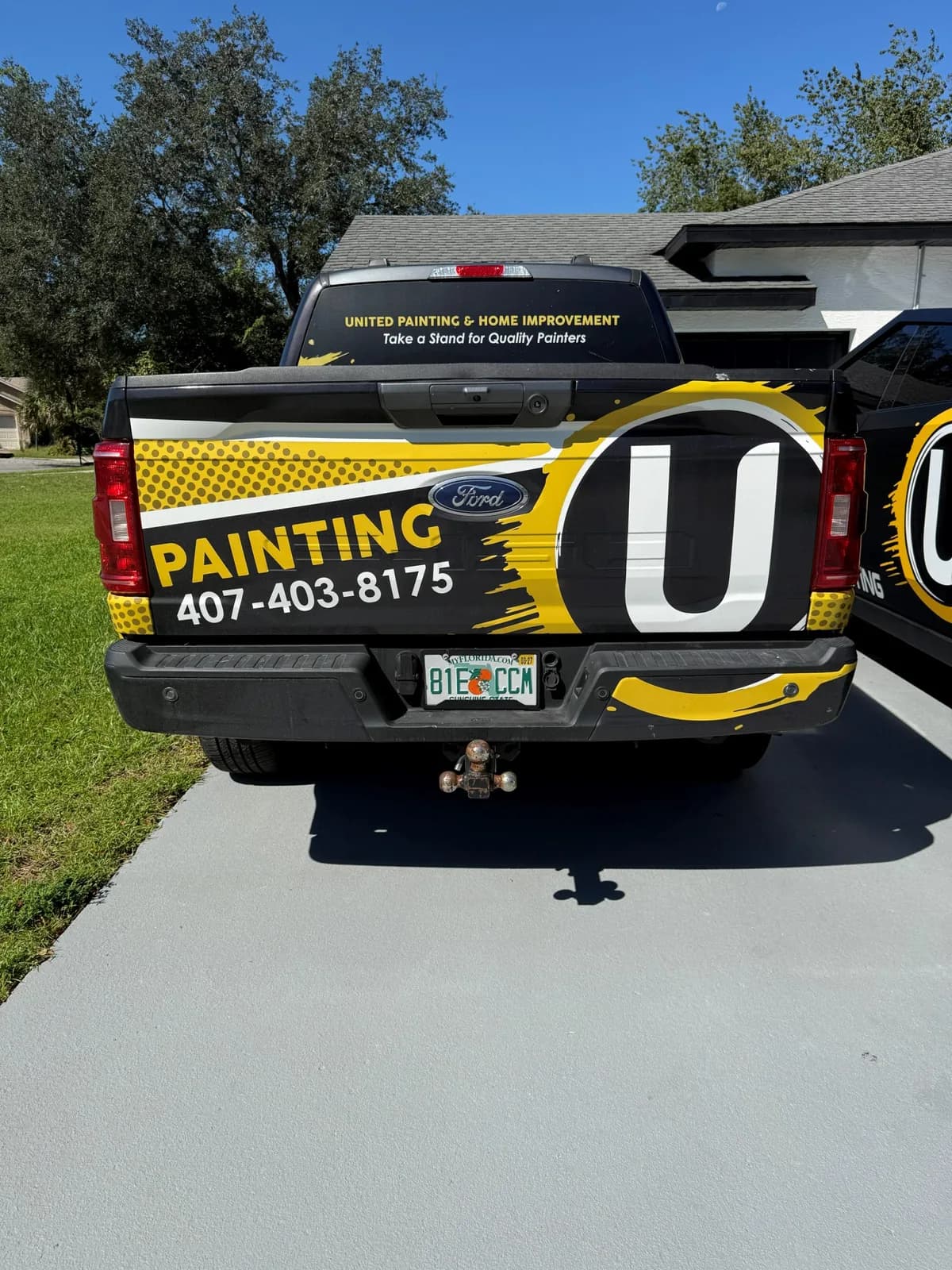 Partial wrap on pickup truck, rear view